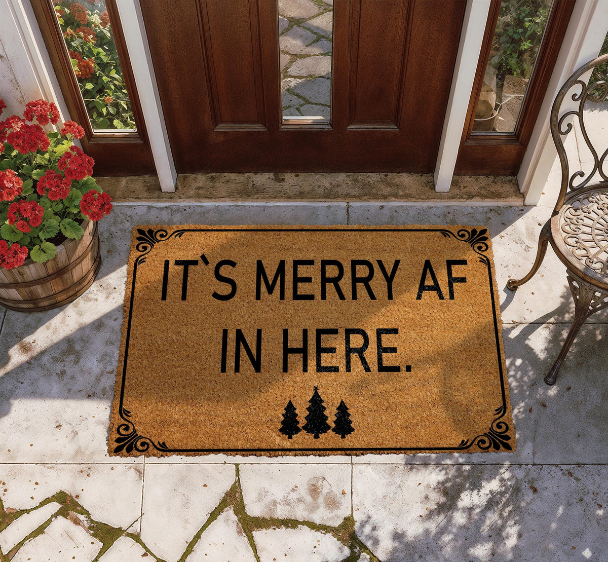 Doormat with "It’s merry AF in here" block lettering and three trees