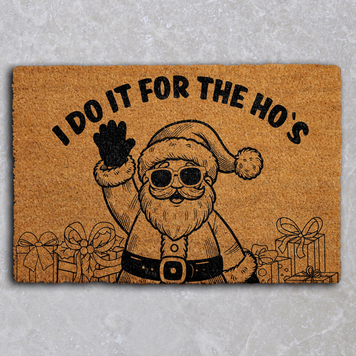 Doormat with Santa in sunglasses and "I do it for the ho’s" lettering