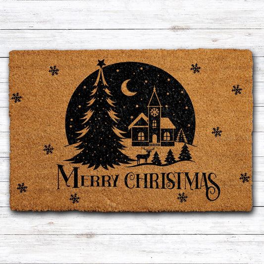 Doormat with a church, evergreen trees, moon and "Merry Christmas" lettering