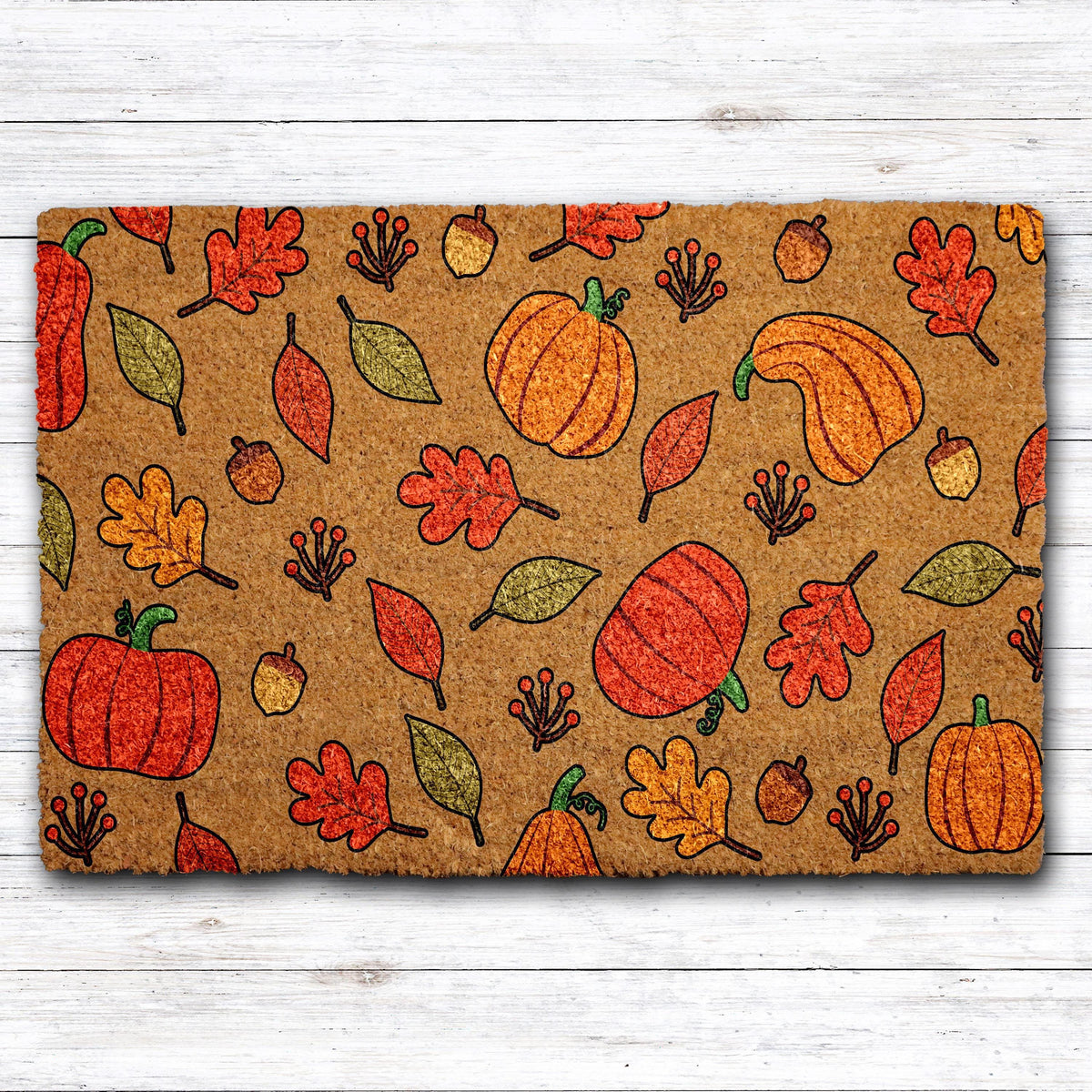 Doormat with autumn leaves, pumpkins and acorns