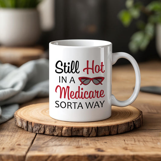 Still Hot In A Medicare Sorta Way Coffee Mug, Funny Retirement Ceramic Cup
