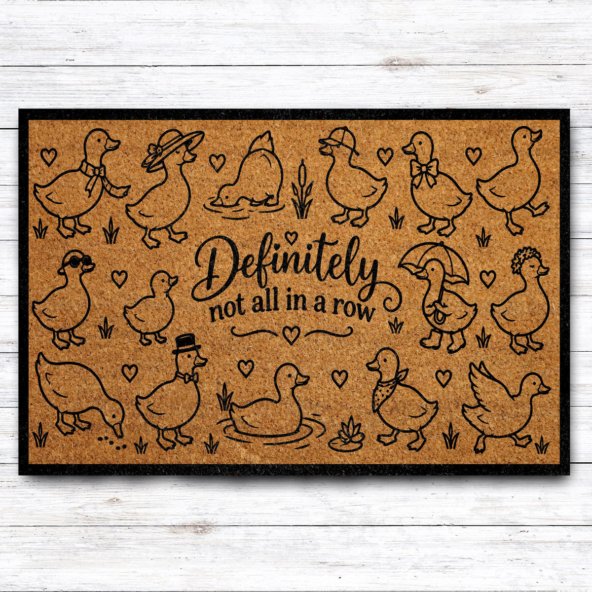 Doormat with dressed-up geese and "Definitely not all in a row" lettering