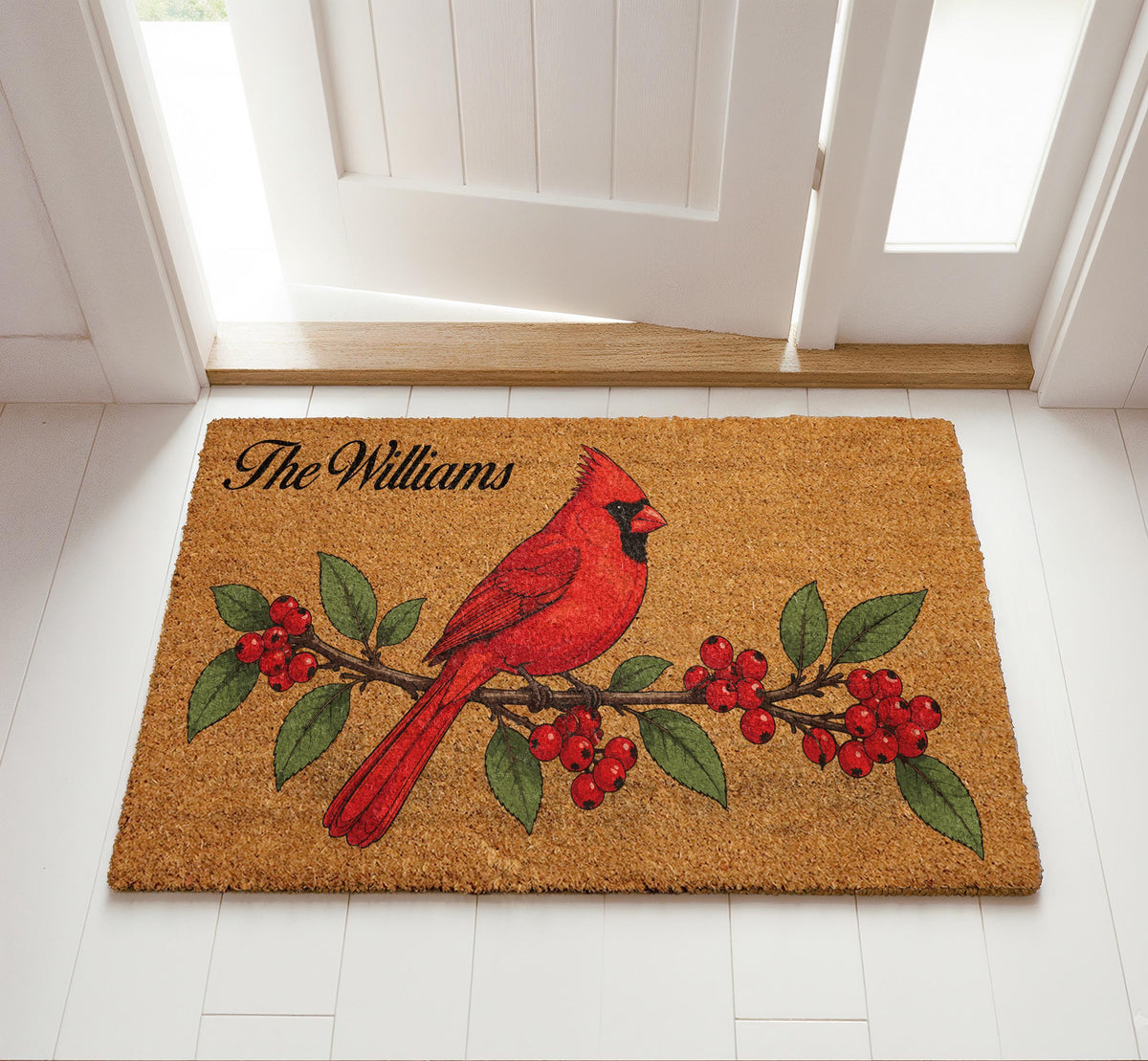 Doormat with a red cardinal on a berry branch and a personalized family name