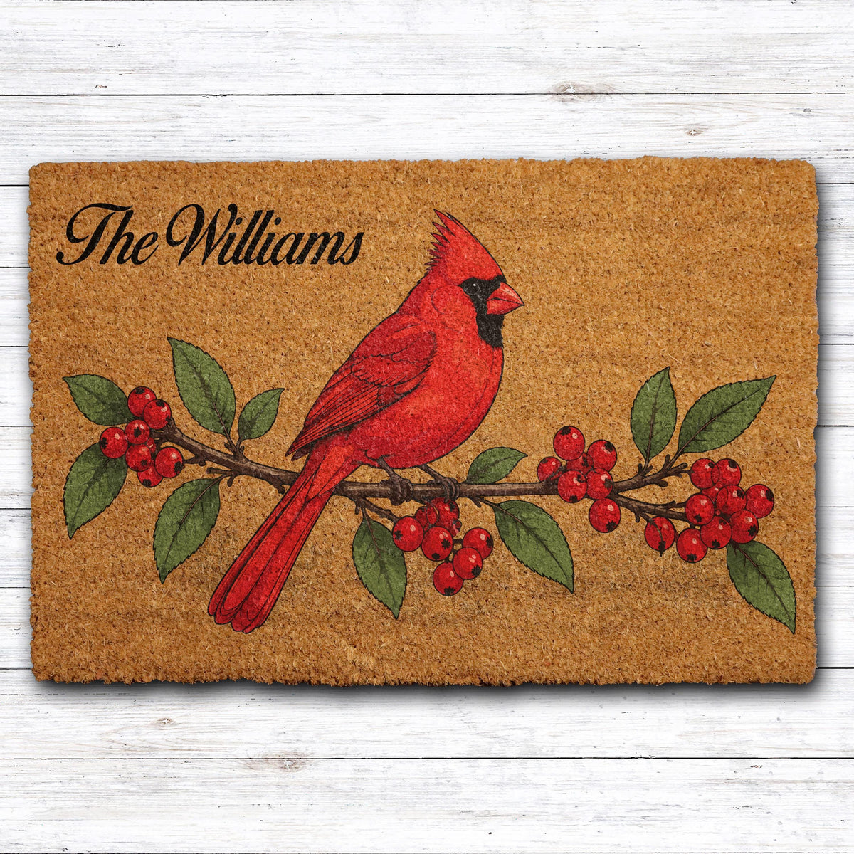 Doormat with a red cardinal on a berry branch and a personalized family name
