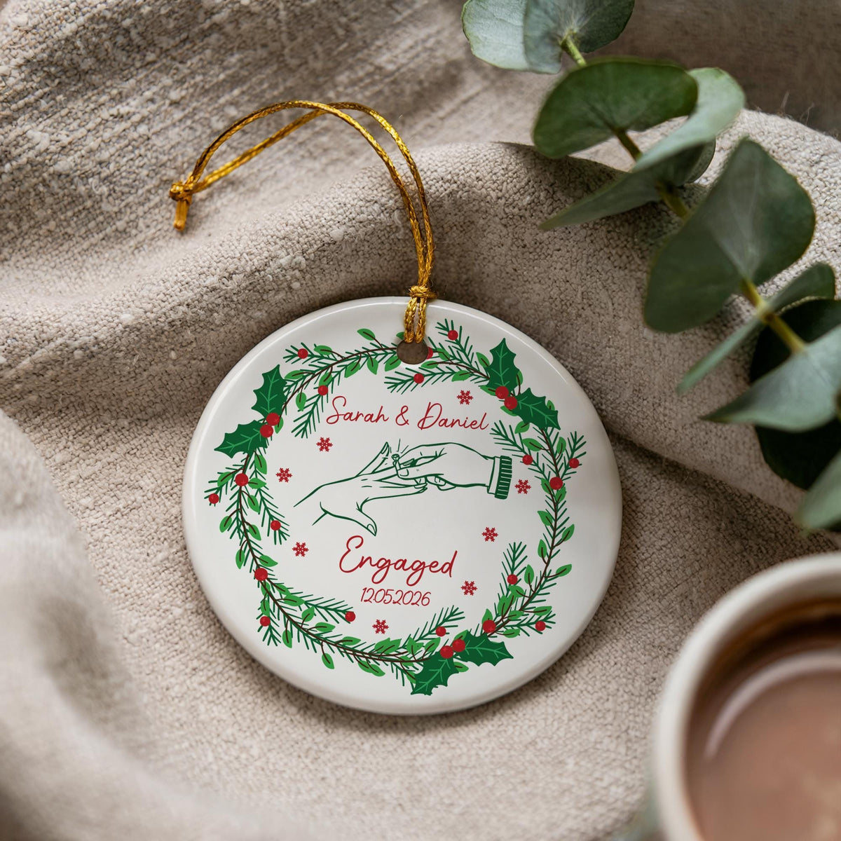 Round ornament with engagement-themed illustrations and personalized lettering