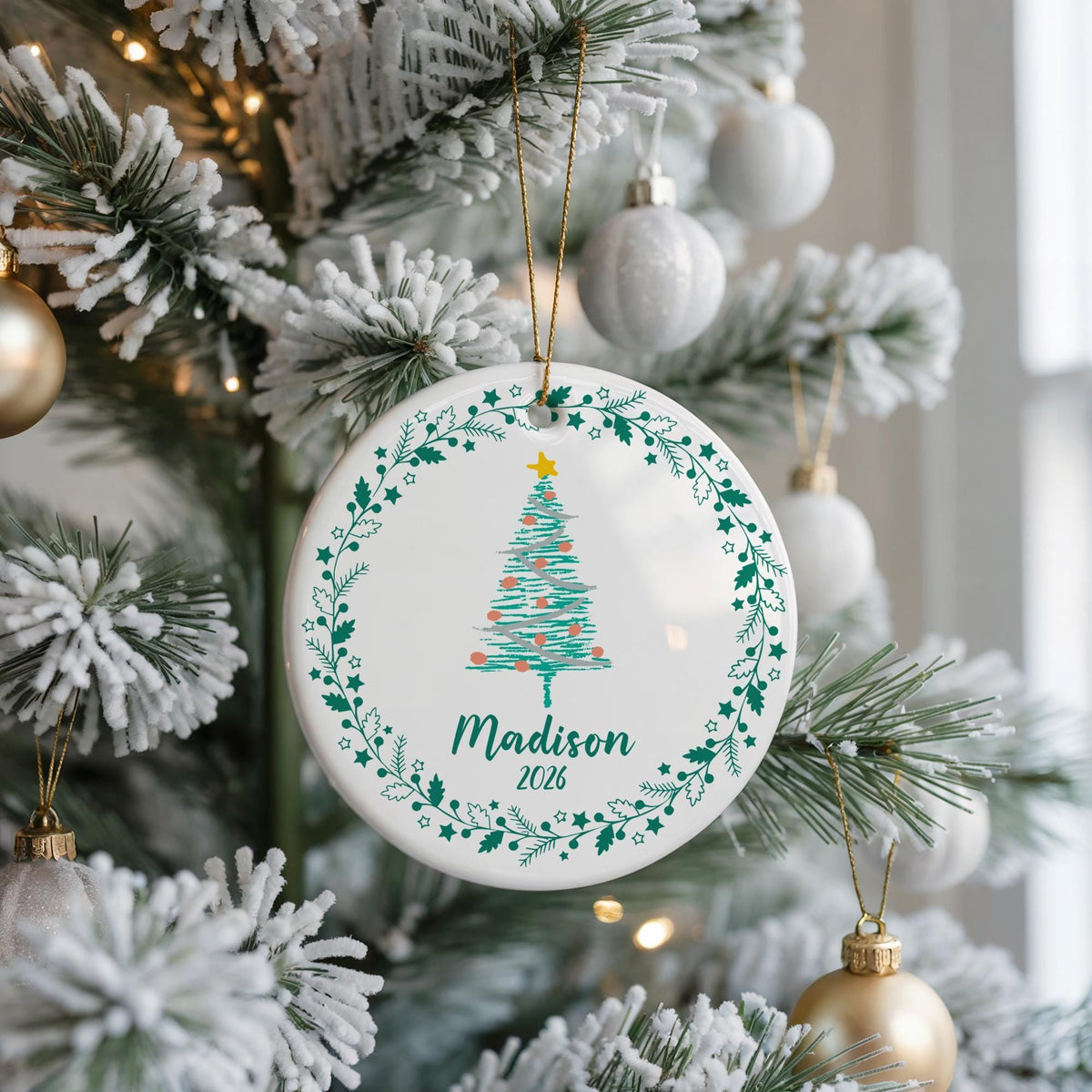 Round ornament with a Christmas tree and a personalized name