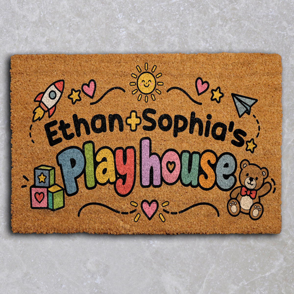 Doormat with playhouse lettering, toys and personalized names
