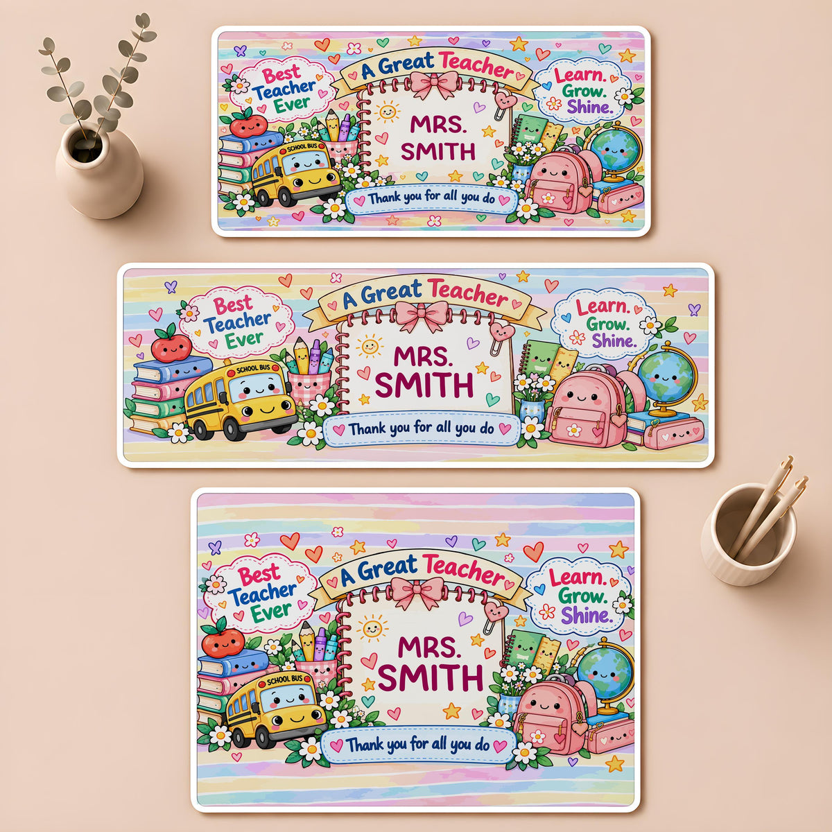 Desk mat with school supplies and a personalized teacher name
