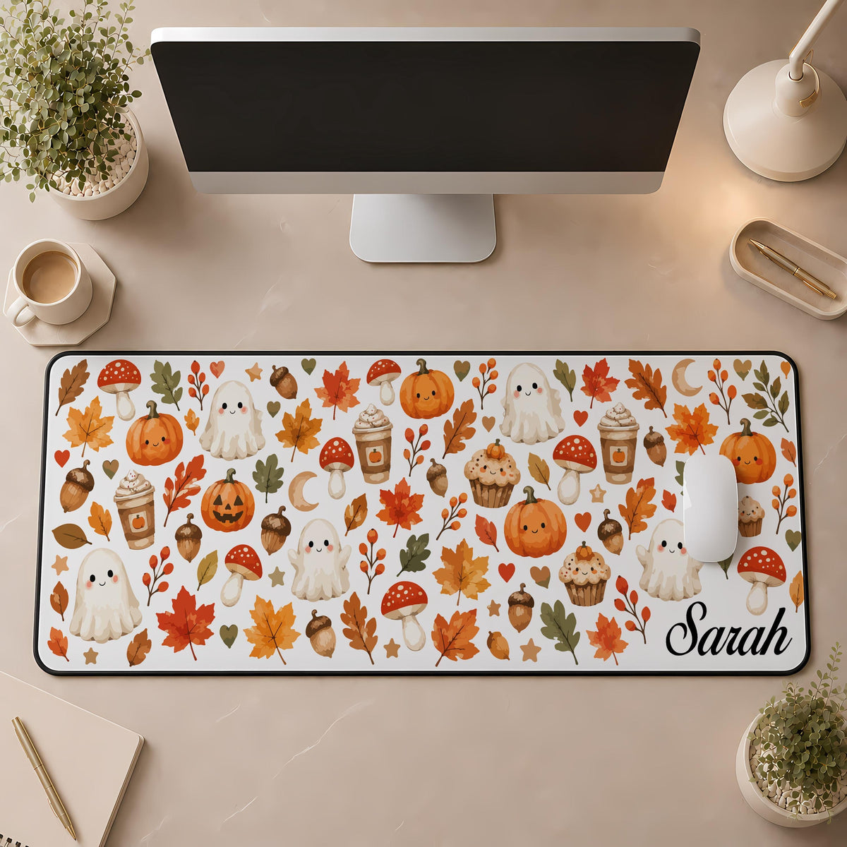 Desk mat with ghosts, pumpkins, autumn leaves and a personalized name