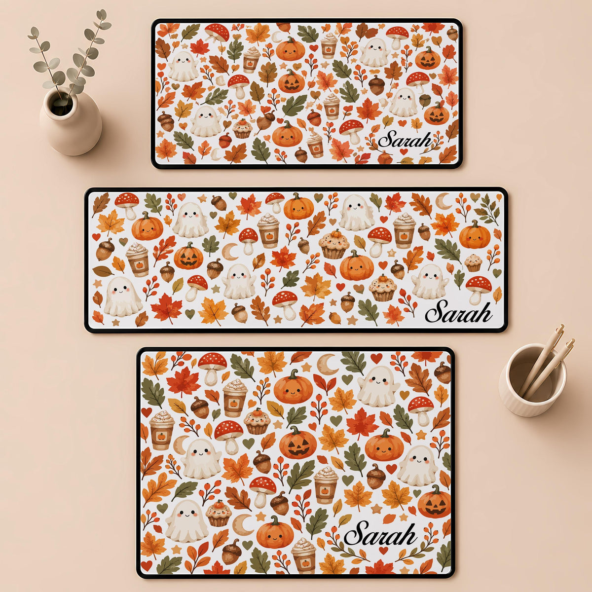 Desk mat with ghosts, pumpkins, autumn leaves and a personalized name