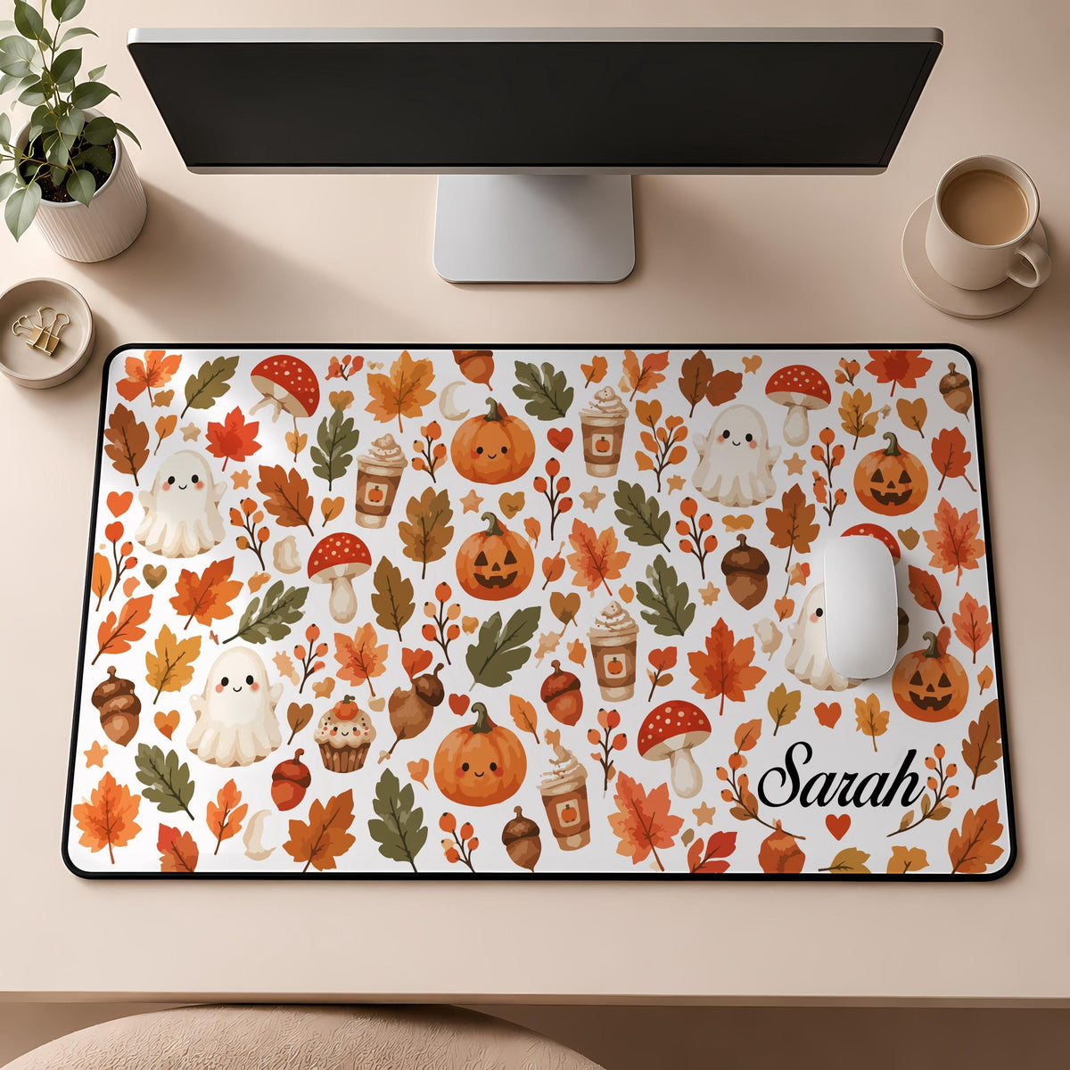 Desk mat with ghosts, pumpkins, autumn leaves and a personalized name
