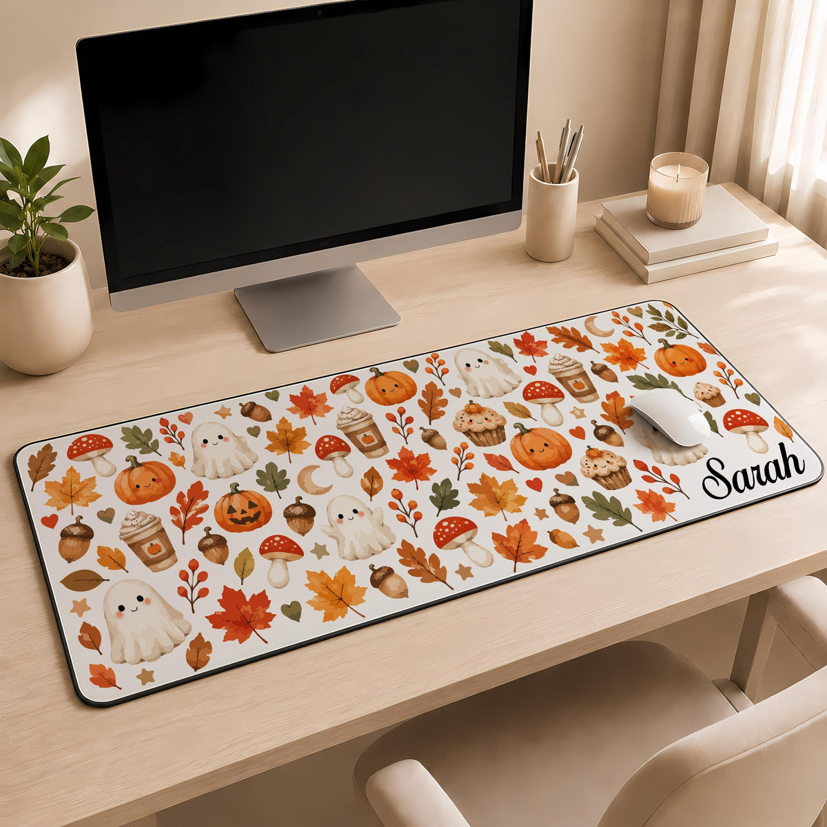 Desk mat with ghosts, pumpkins, autumn leaves and a personalized name