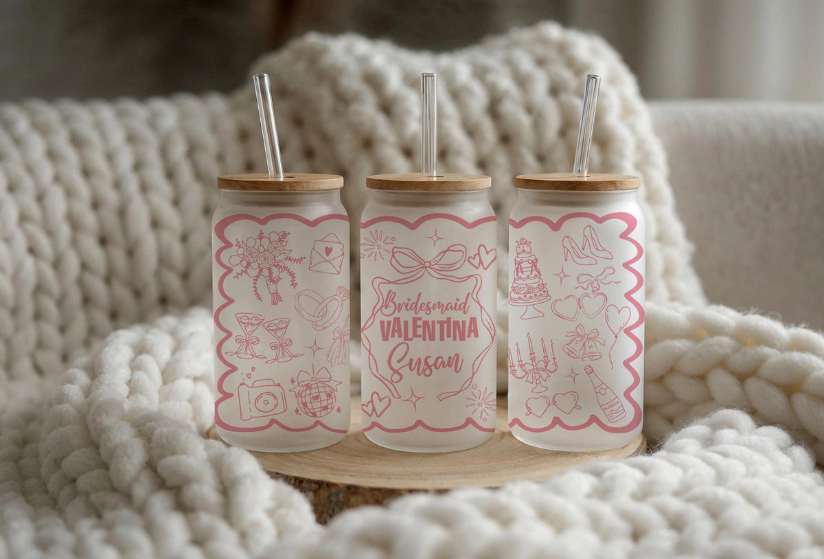 Glass with pink bridesmaid lettering, bows and wedding illustrations