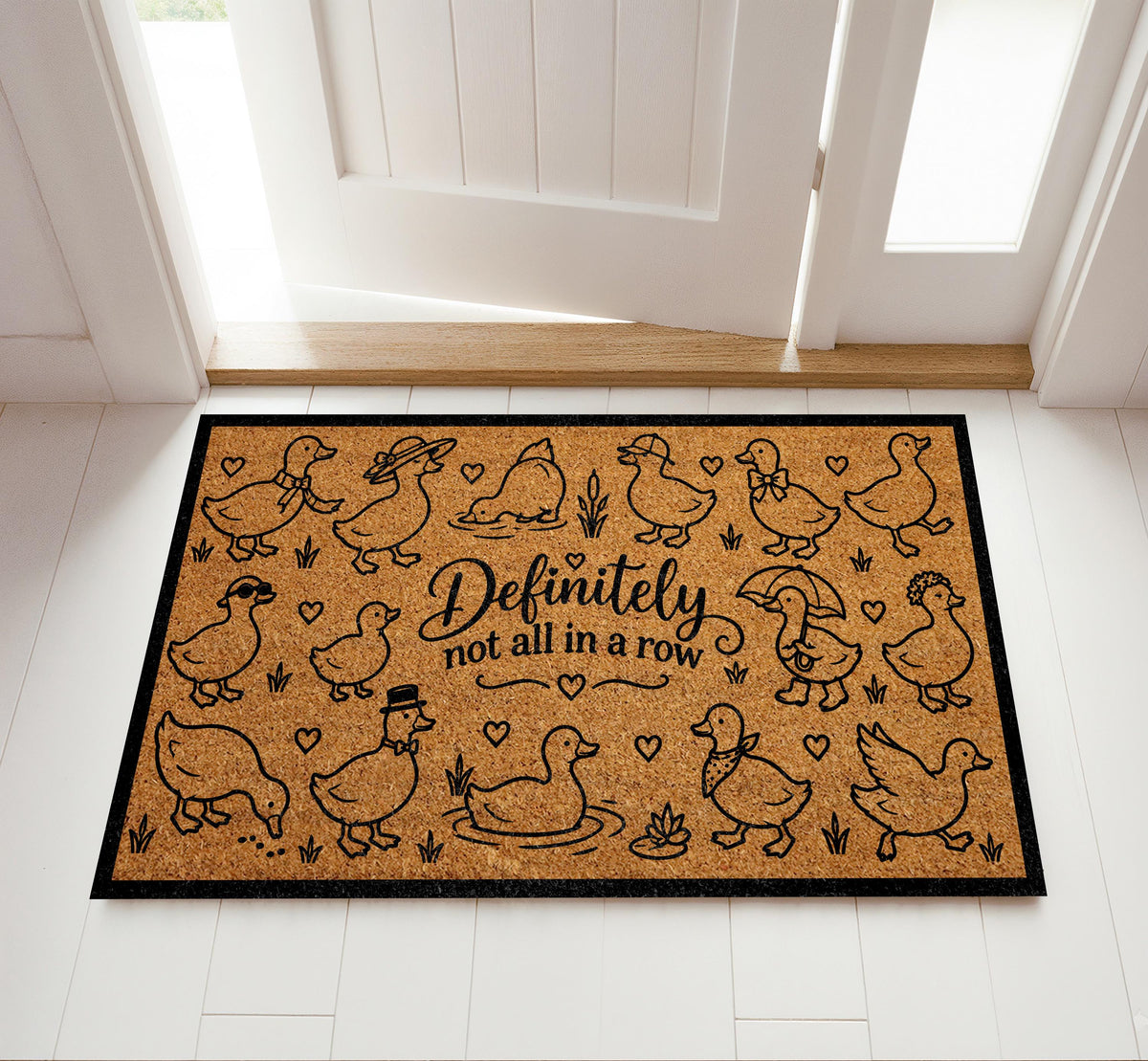 Doormat with dressed-up geese and "Definitely not all in a row" lettering