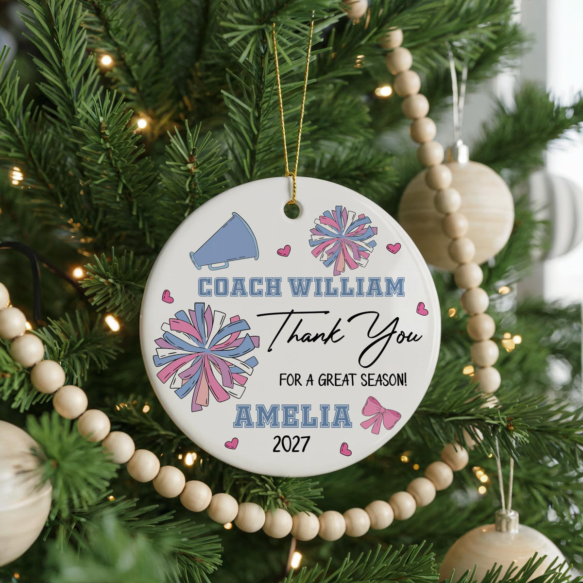 Round ornament with pompoms and personalized cheer coach lettering