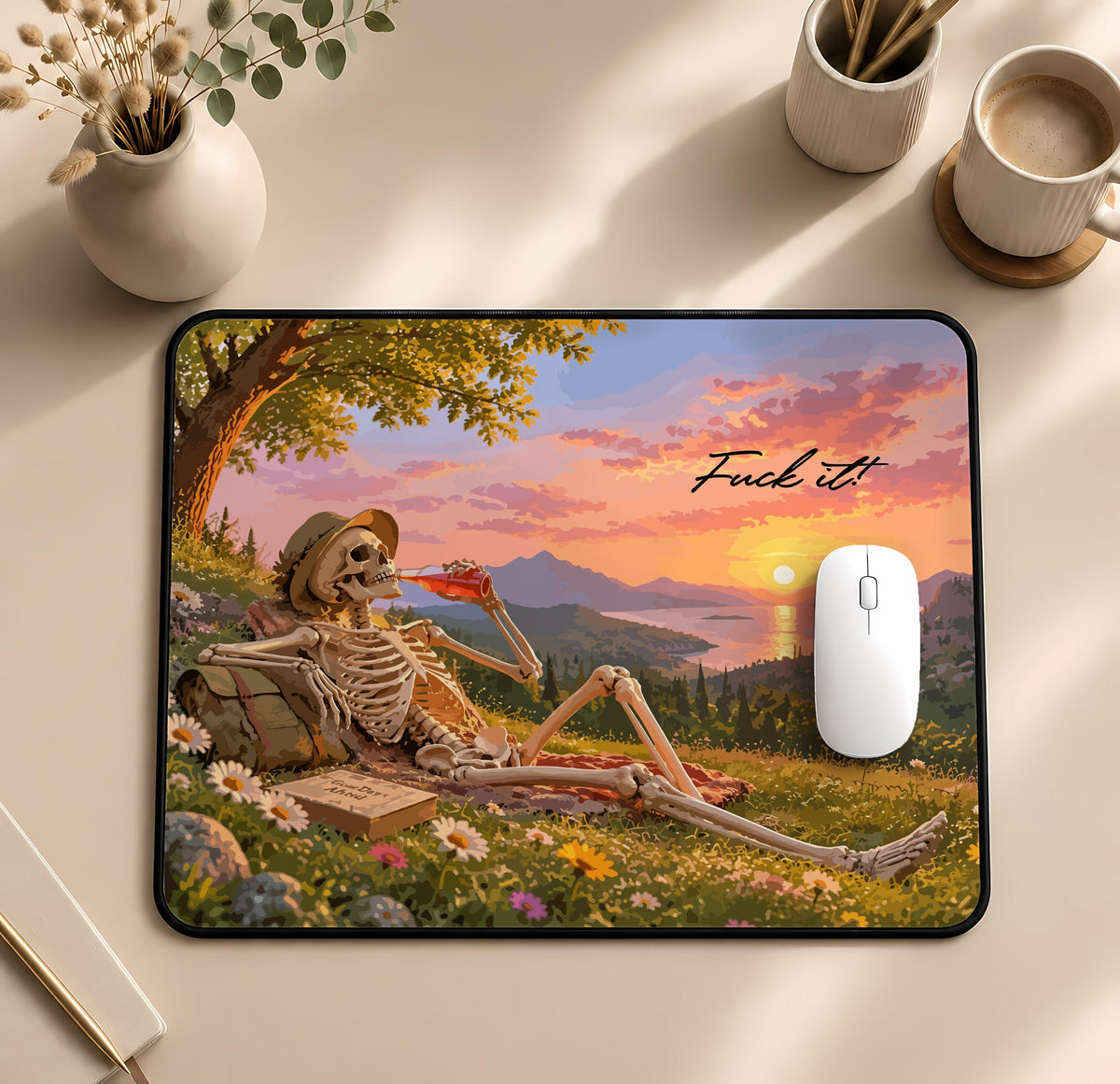 Desk mat with a reclining skeleton, landscape and "Fuck it" lettering