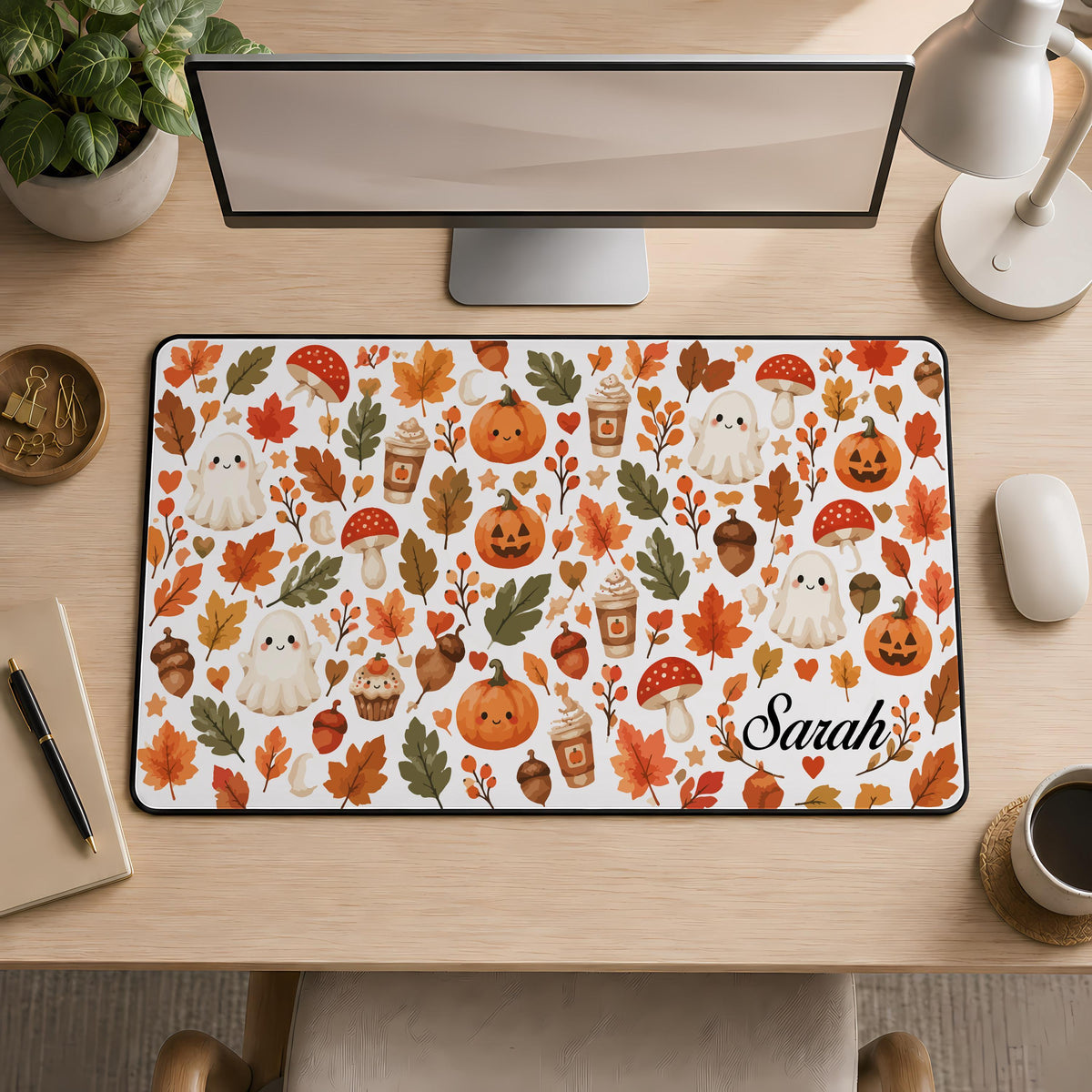 Desk mat with ghosts, pumpkins, autumn leaves and a personalized name